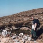 Alan with wreckage at the crash site of Consolidated Liberator FL949, Cuilags, Island of Hoy, Orkney